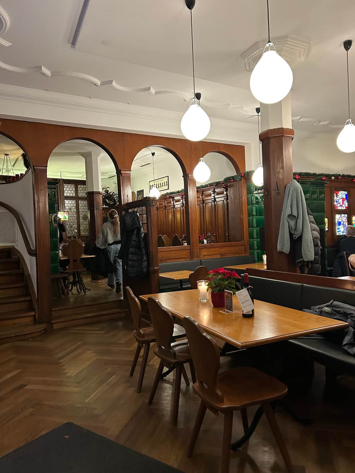 The wood-panelled dining room of the Löwenzorn with its round arches