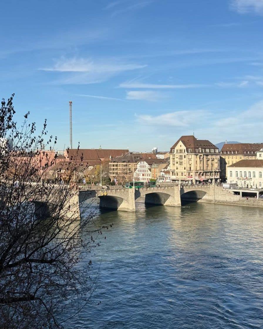 The Mittlere Brücke with its stone arches over the Rhine in Basel, with the houses of the Kleinbasel bank behind